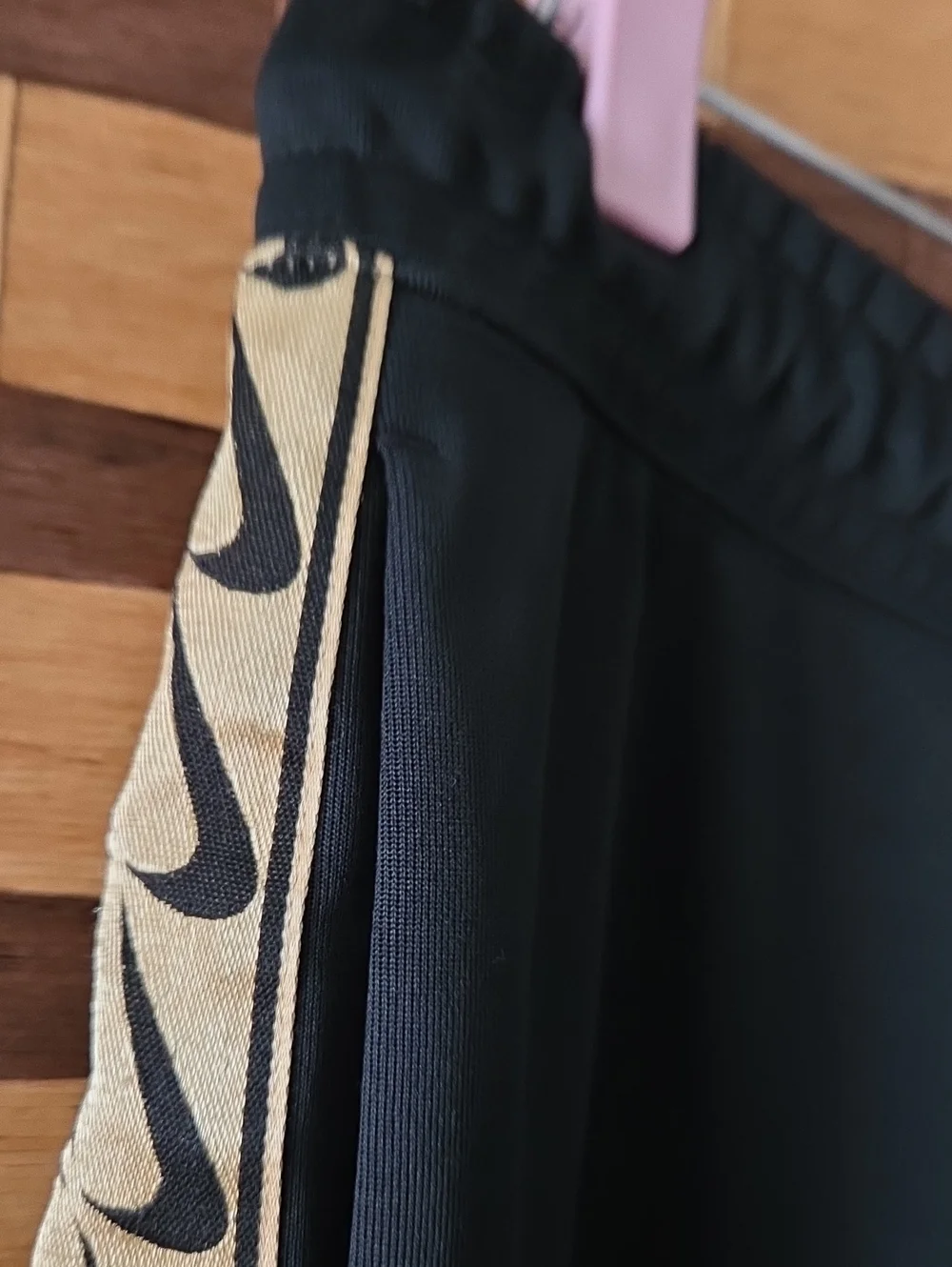 Nike  Black Track Pants with Contrasting Gold Side Stripe